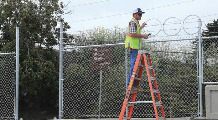 New fence blocks out homeless camp