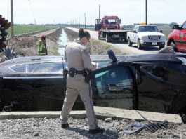 PHOTO: SUV careens into drainage ditch