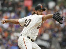 Bumgarner gets 2nd win since return as Giants top Cubs 3-1