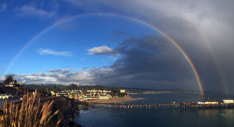 AFTER THE RAIN A double rainbow opens up over Capitola during one of numerous recent downpours. —Tarmo Hannula/The Pajaronian