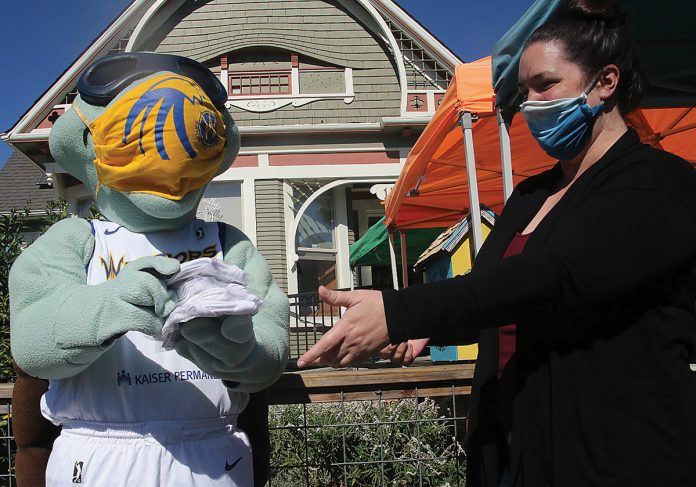 Santa Cruz Warriors mask distribution