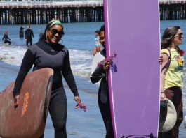 Surfers celebrate Juneteenth in Santa Cruz paddle out Juneteenth Cowell's beach