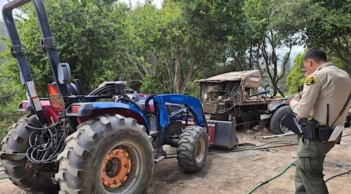 Two suspects arrested with stolen tractor