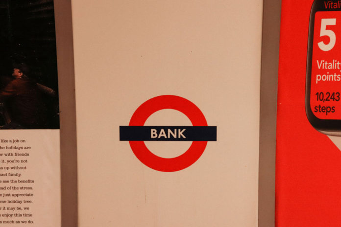 A sign for a bank, illustrating the traditional financial systems that instant withdrawal casinos are moving beyond