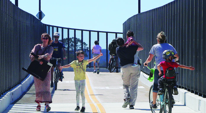 Long-awaited pedestrian bridge opens over Highway 1