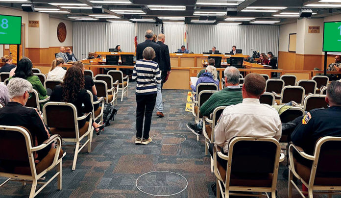 Santa Cruz County board of supervisors meeting People waiting to talk at a government meeting