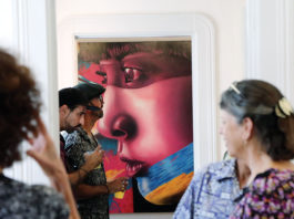 “Off the Streets” in the gallery Visotors to the PV Art gallery look at various creations